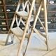 Old small painter's stepladder, wooden trade furniture, step stool