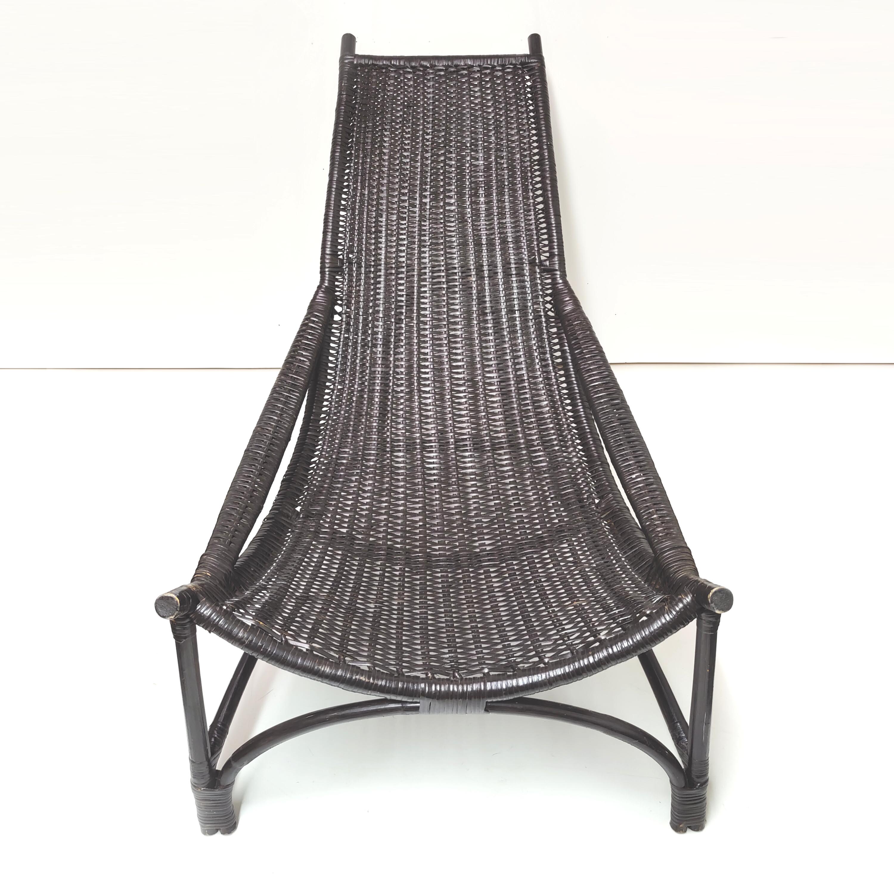 Vintage black rattan deck chair