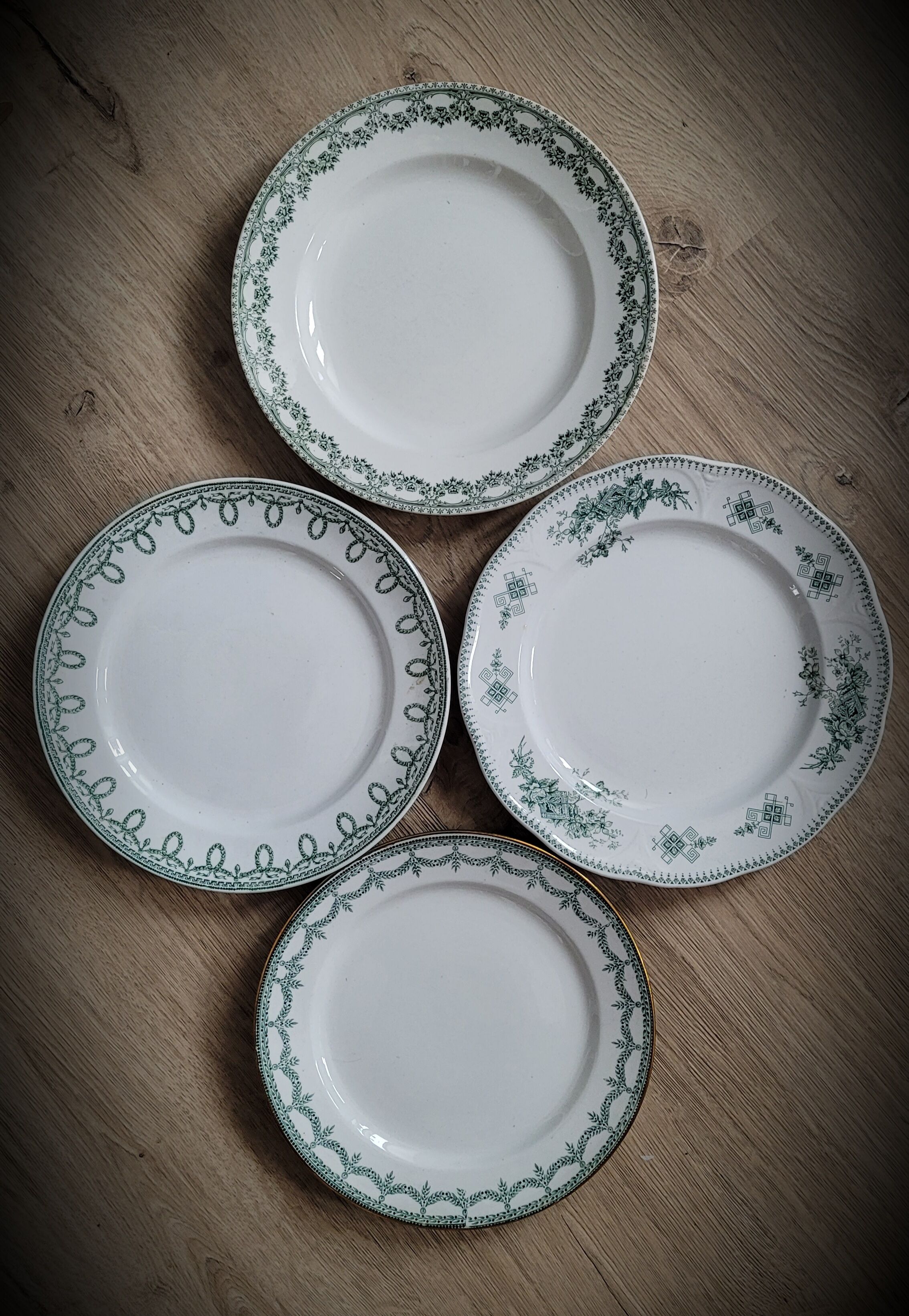 Set of 4 mismatched green plates