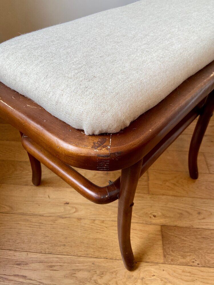 Wooden and beige cotton piano bench