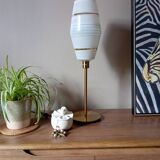 Mid-century gold metal table lamp with white striped shade