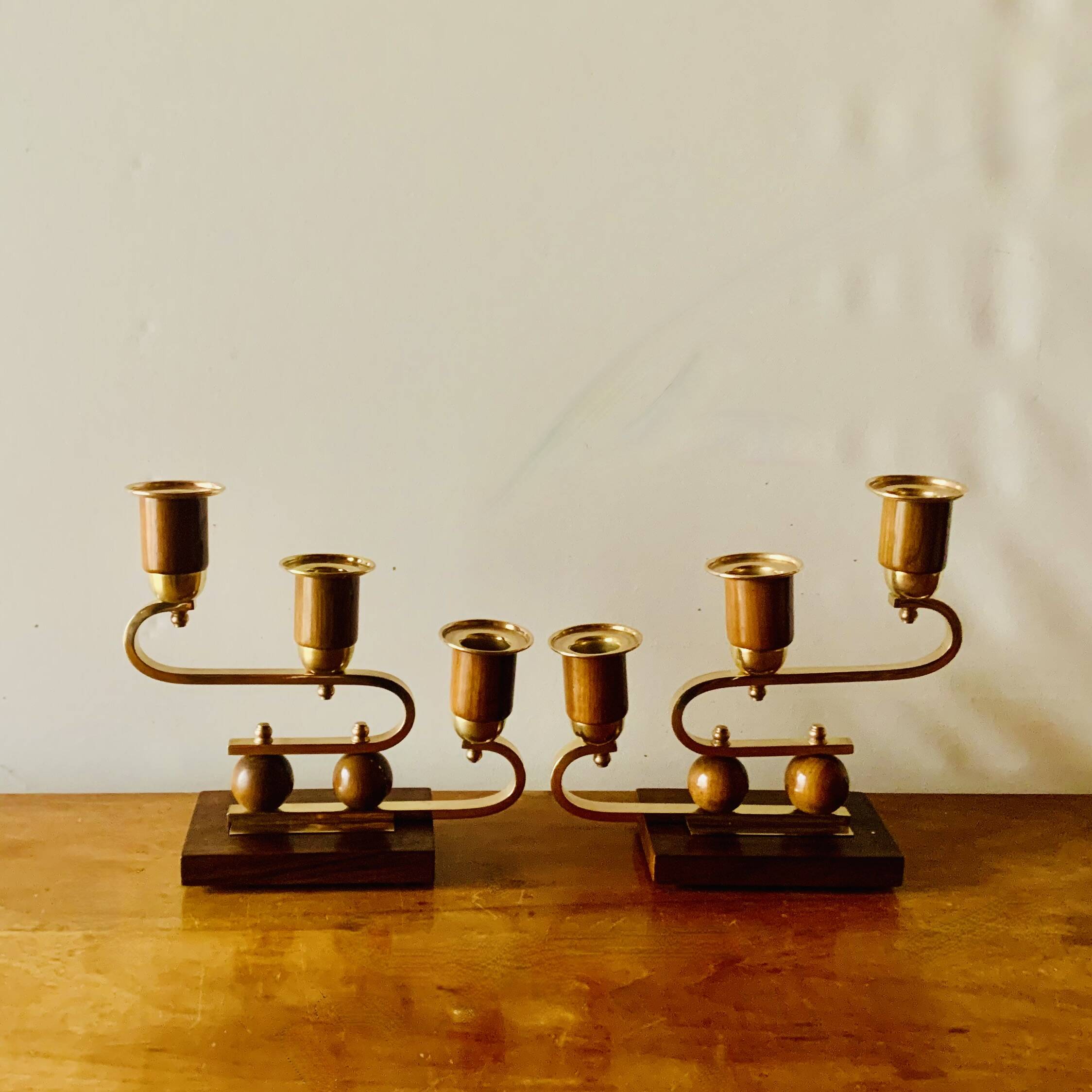 Pair of Art Deco candlesticks in gilded brass and wood