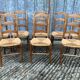 8 antique Vendée straw chairs in solid cherry wood.