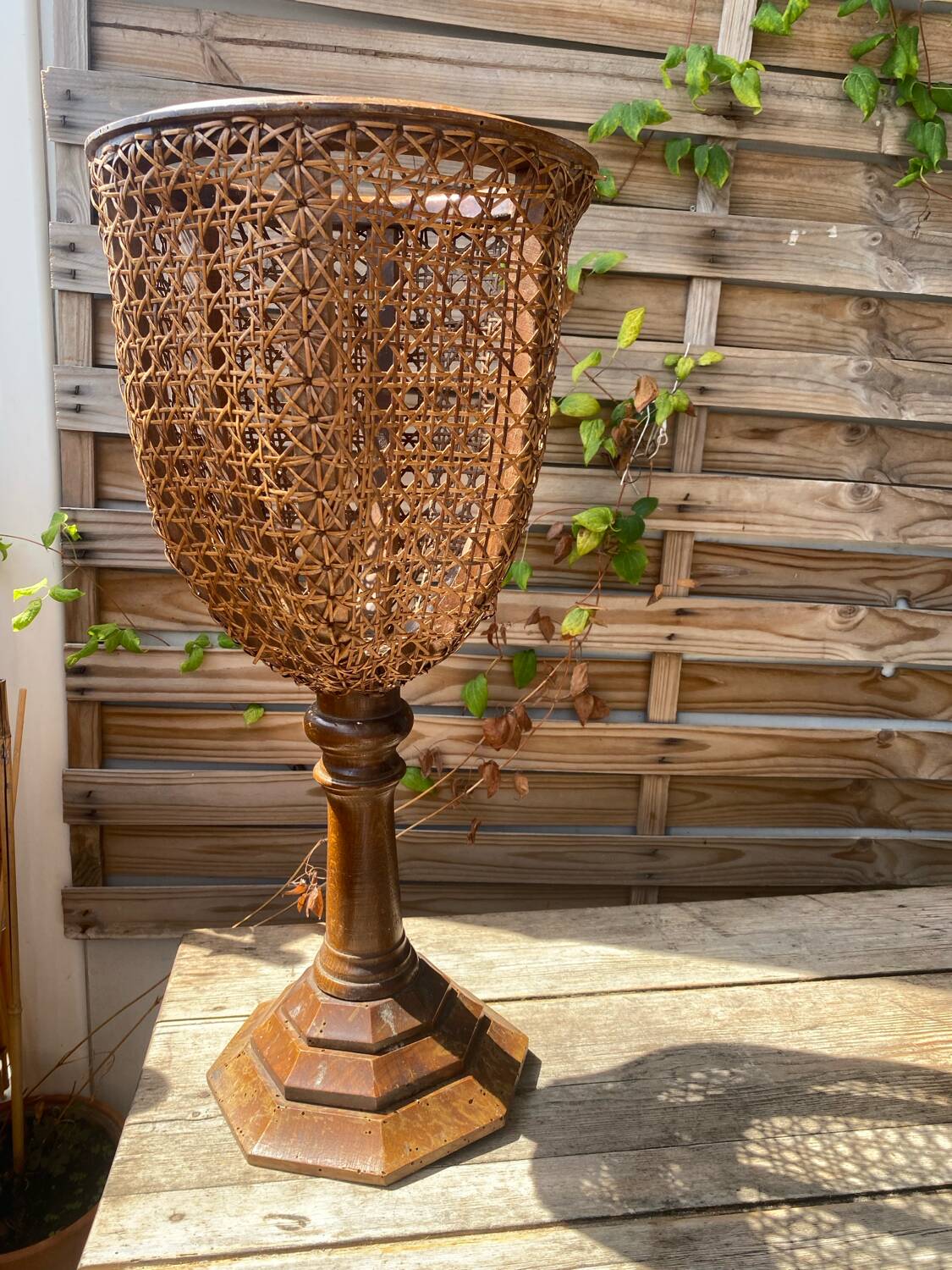 Italian plant holder in woven rattan