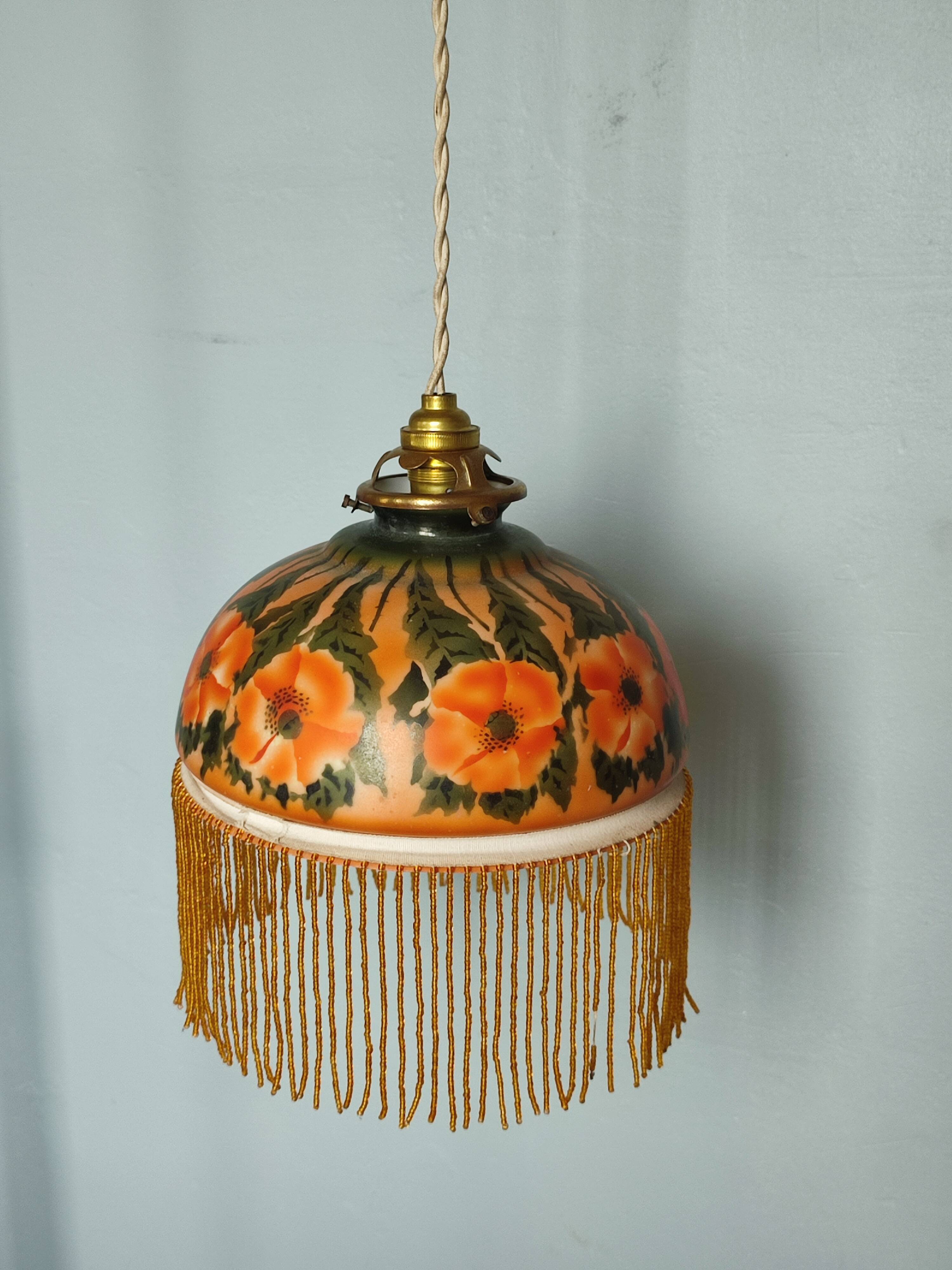 Old opaline and its tassels hanging lamp