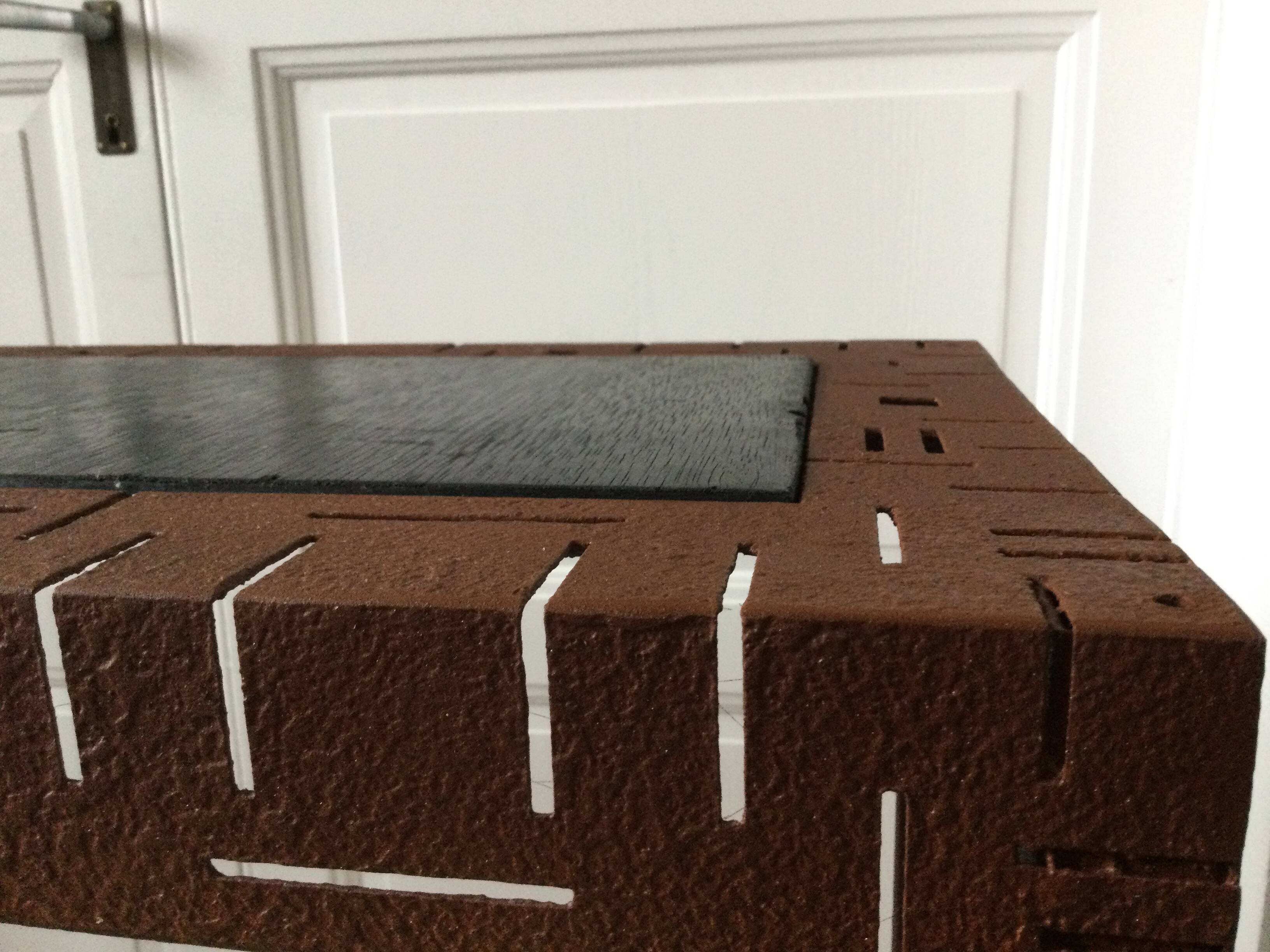 Perforated sheet metal and wood console