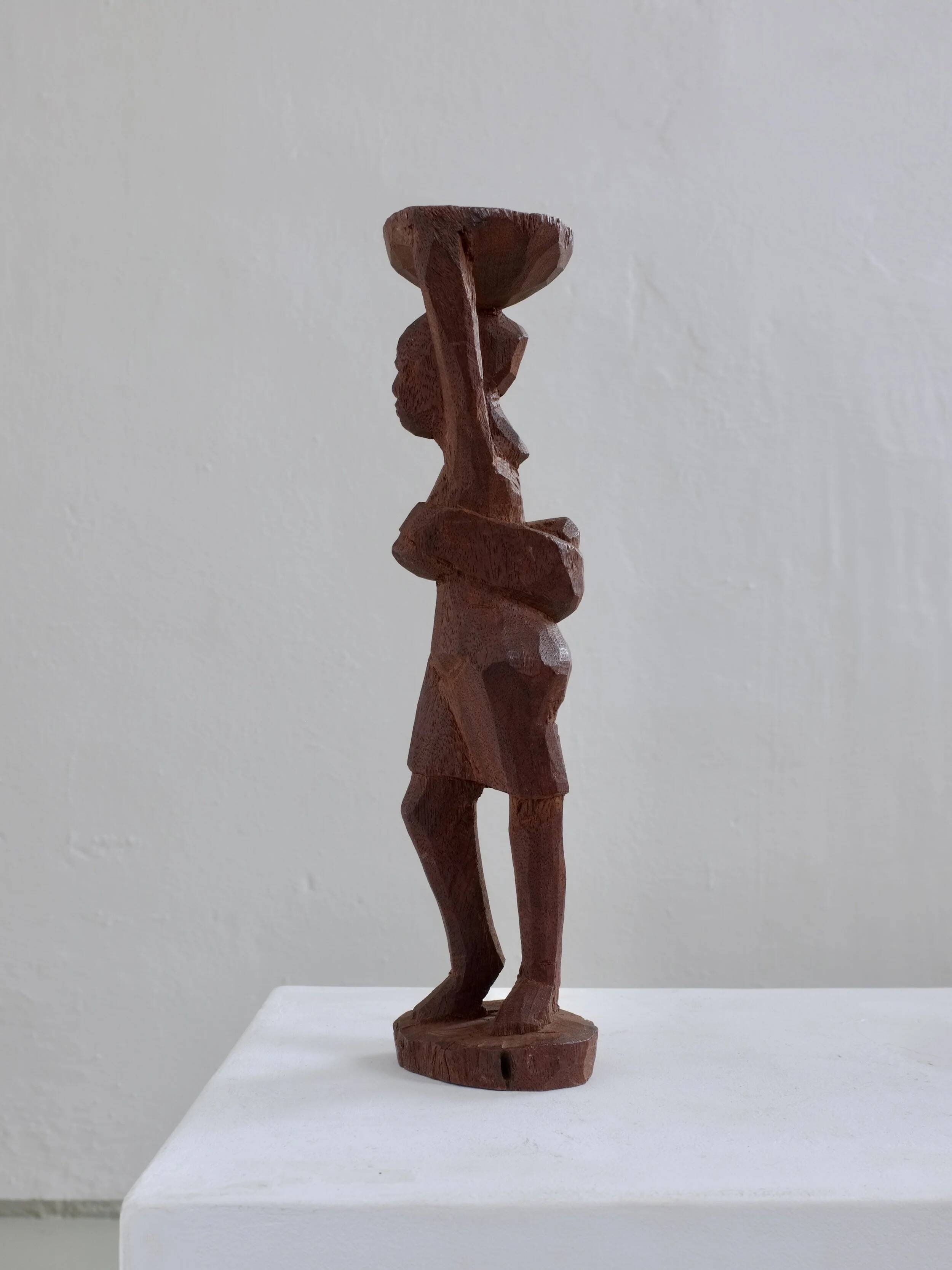 Mid-century hand-carved African woman sculpture