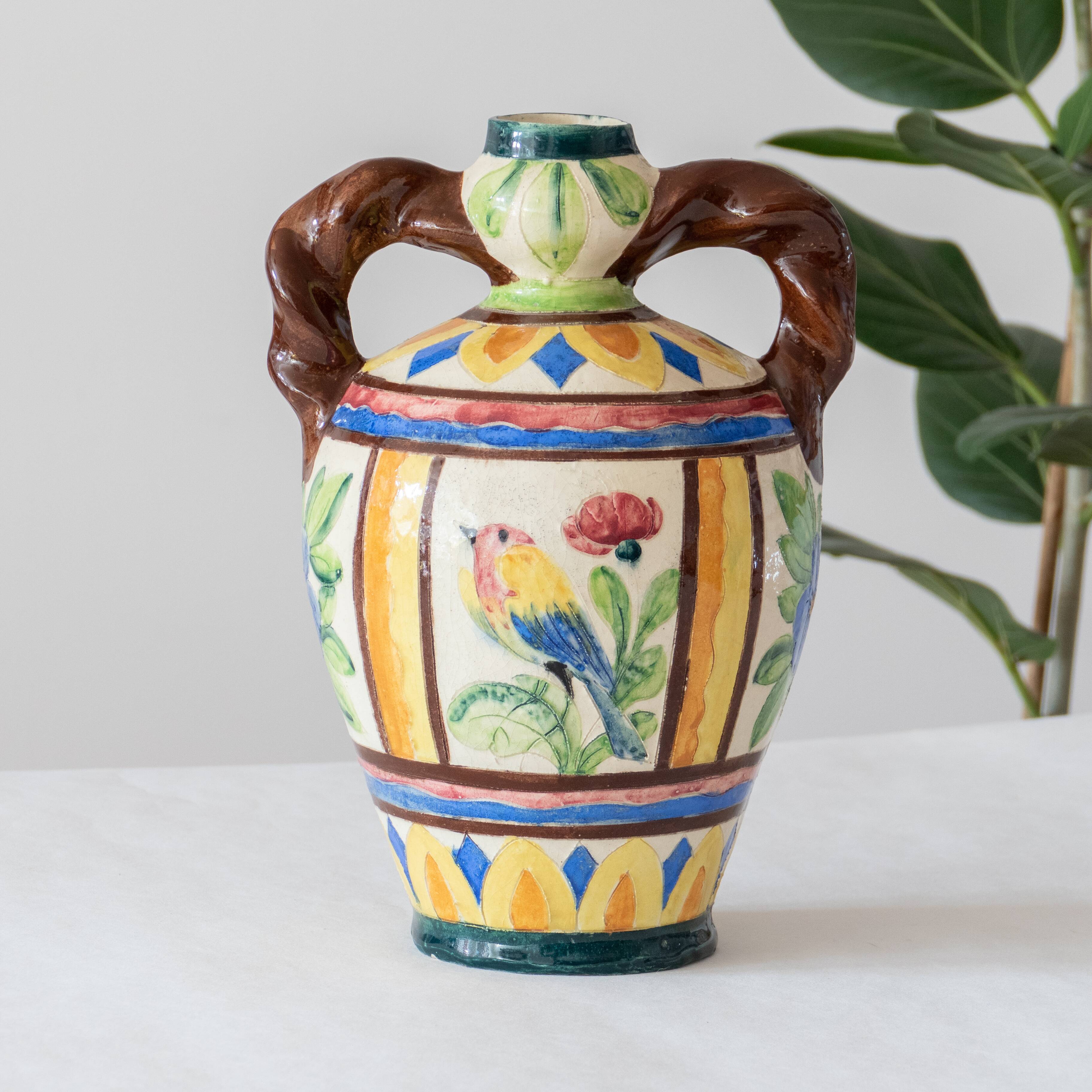 Old handcrafted amphora / polychrome bird glazed terracotta vase