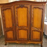 Wooden style wardrobe, 3 doors and 9 internal shelves.