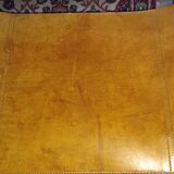 Three  leather armchairs