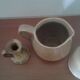 Set of three objects including bottle'milk jar and small stoneware carafon