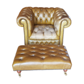 Chesterfield armchair and footrest in green leather