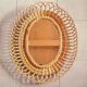 Miroir ovale en rotin 1960
