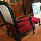 Old children's armchair with foot rests