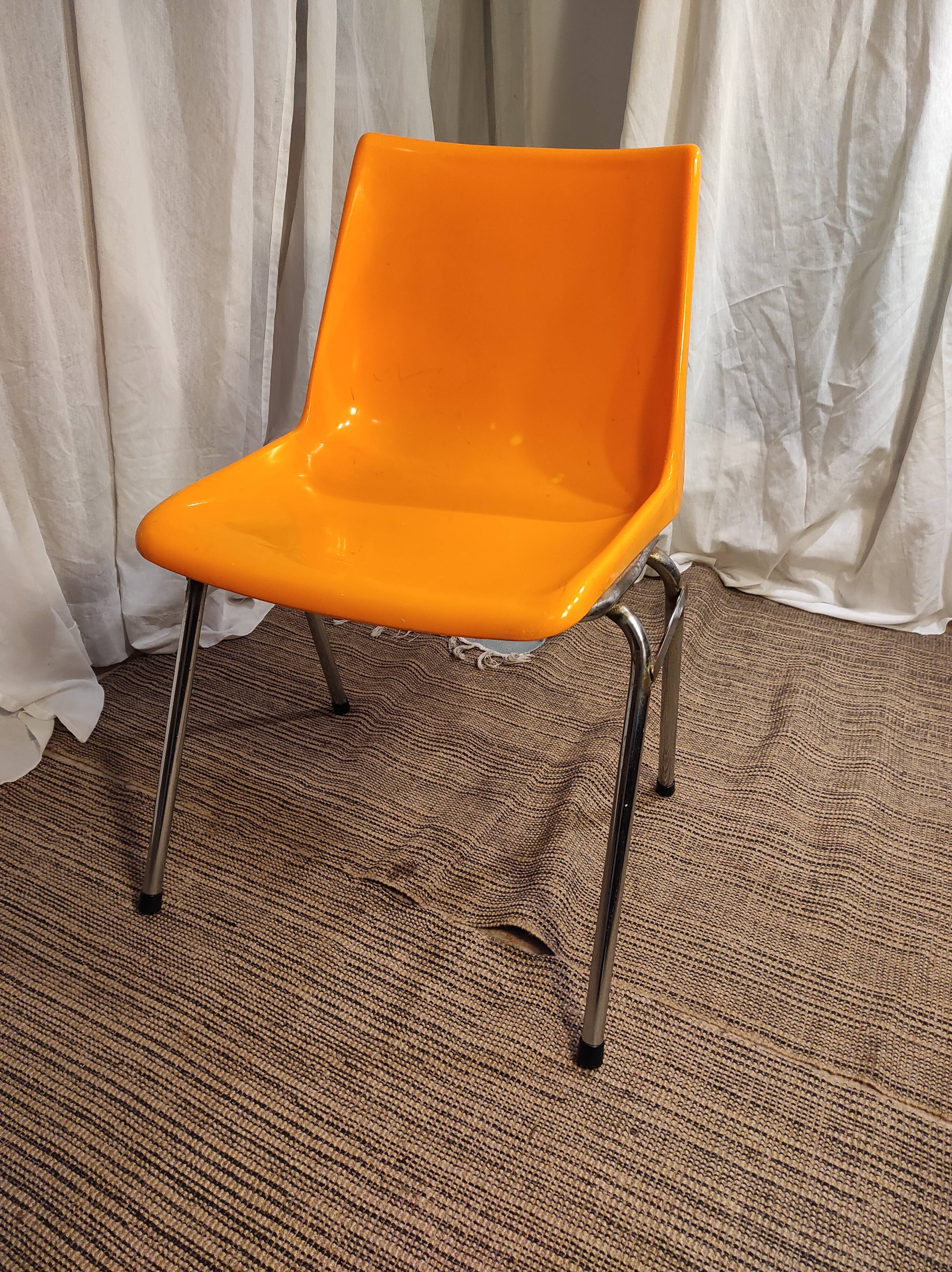 Orange plastic chair 1970