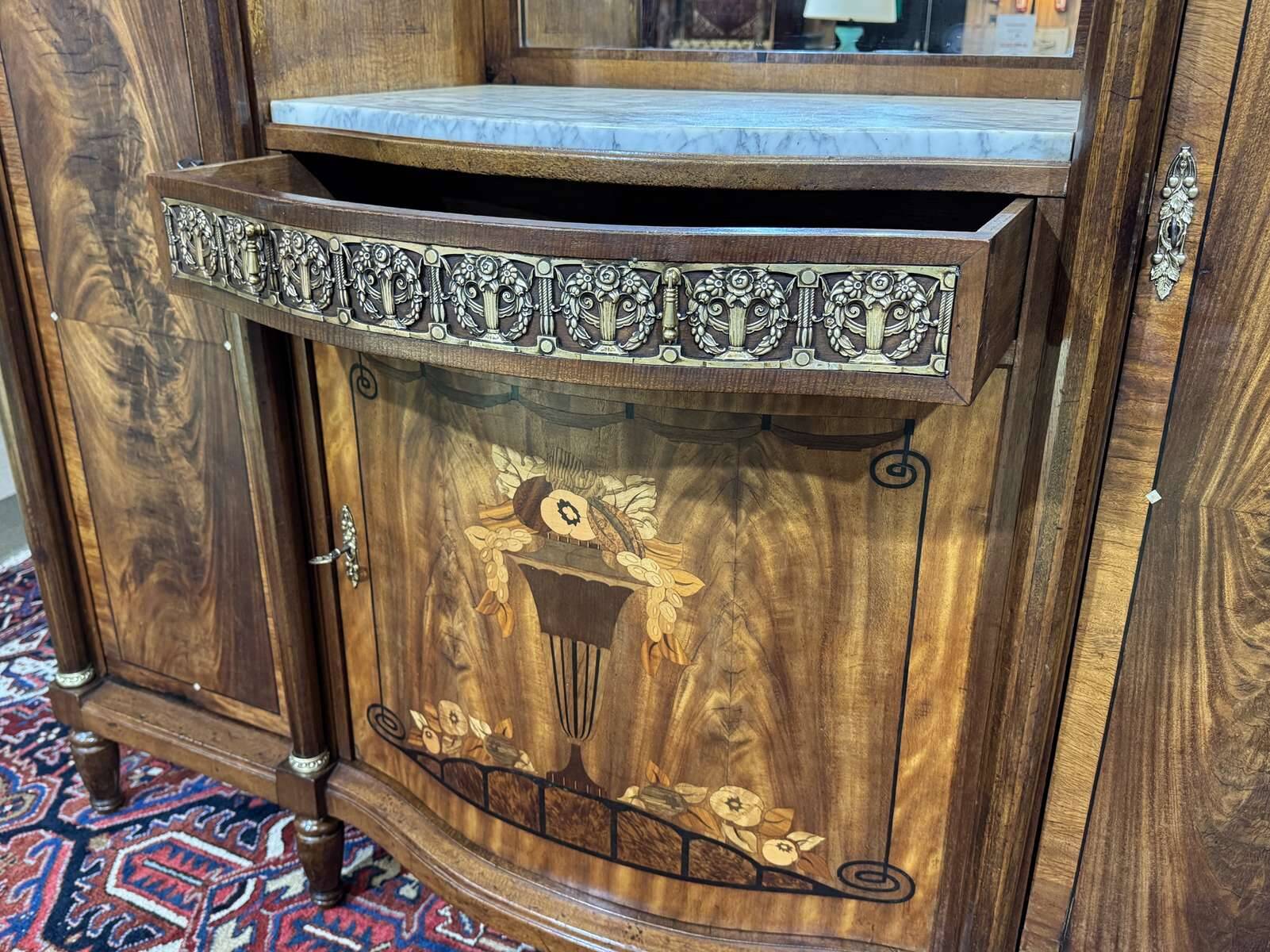 Art Deco buffet in mahogany, oak, and marble top.