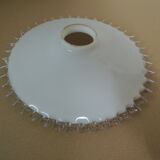 Opaline suspension with serrated edges