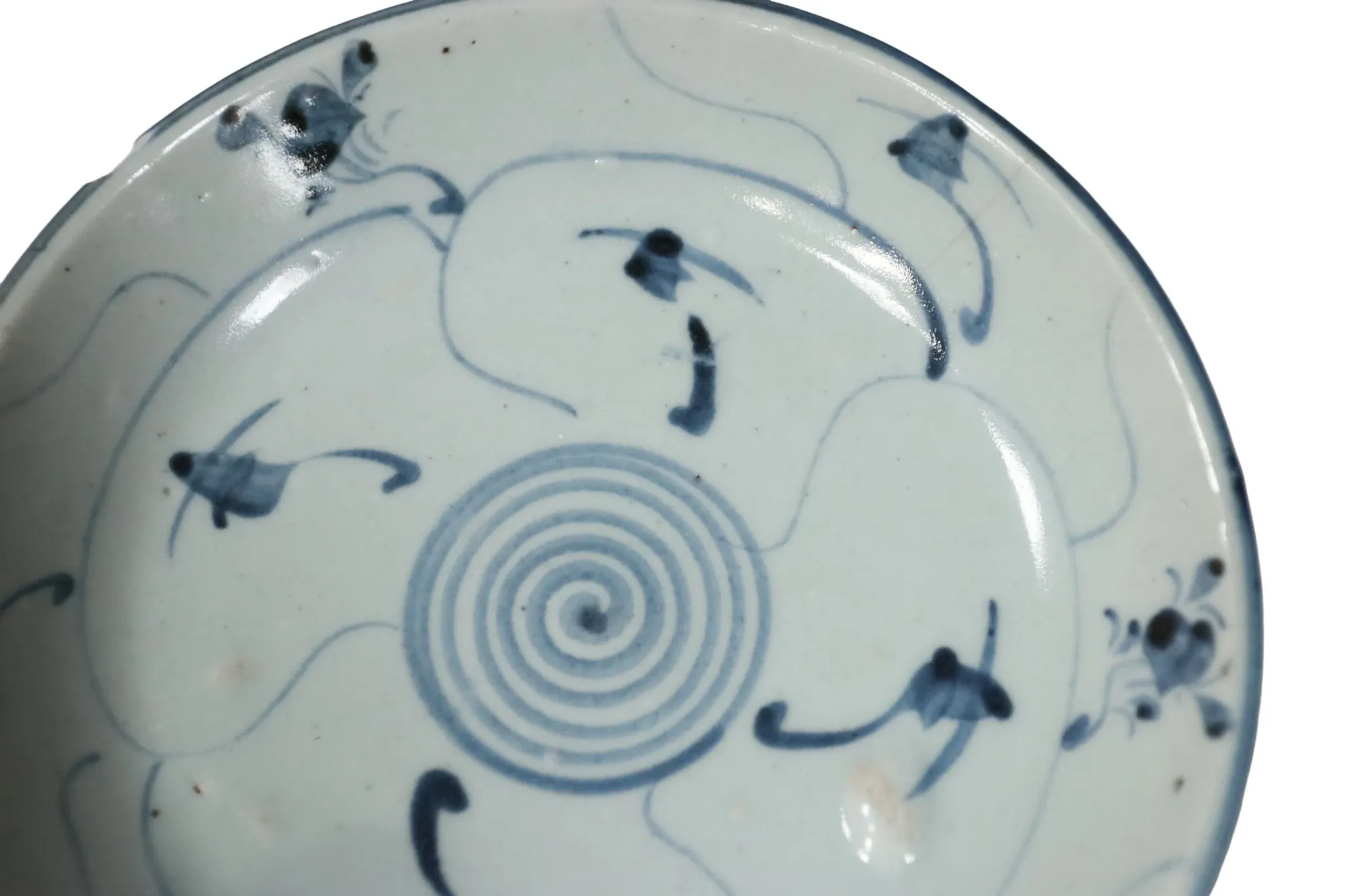 Chinese blue and white dish with spiral lotus decoration – Fujian, c.1800