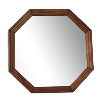 Miroir ancien d'occasion en bois, forme octogonale.