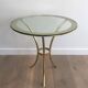 Pair of round gold side tables