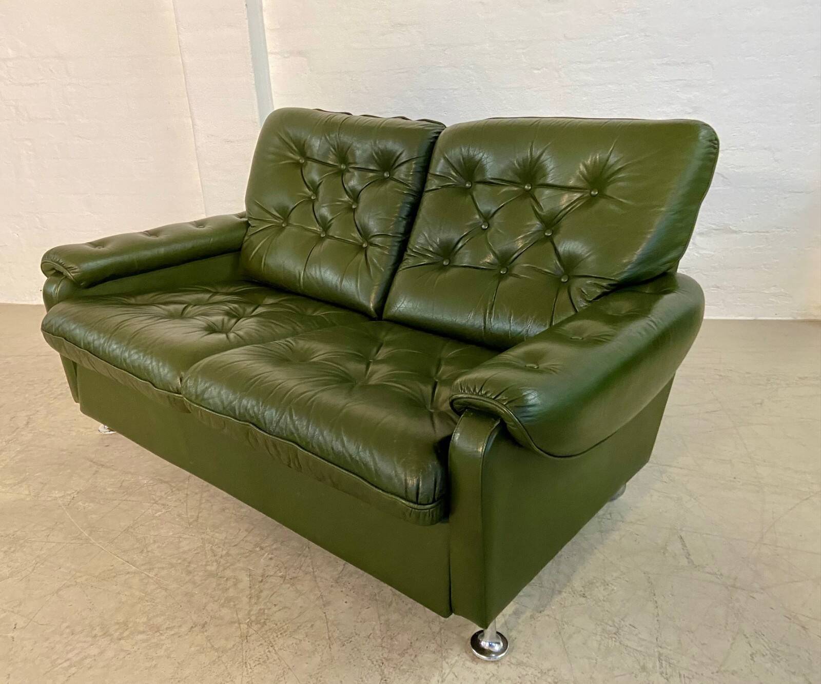 Vintage retro Danish 2 person olive green buttoned leather sofa 1970s
