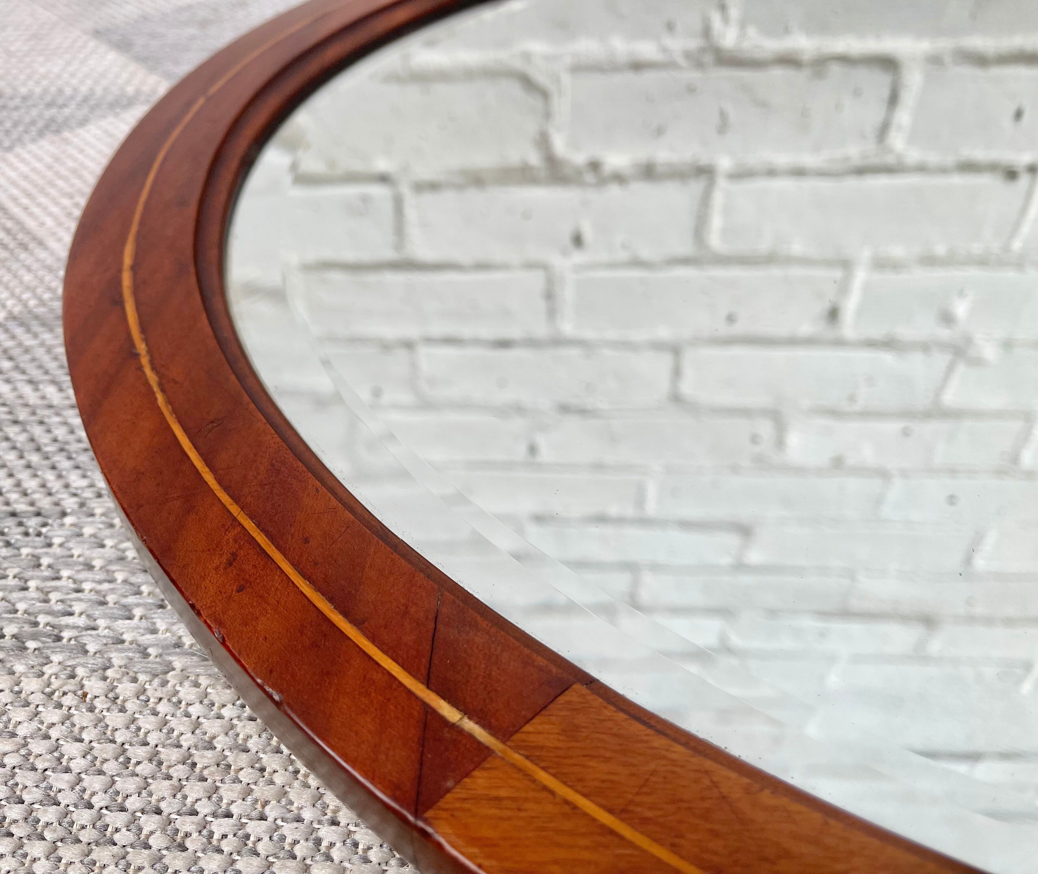 Vintage oval bevelled mirror mahogany frame