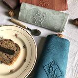 Set of four napkins dyed in multiple colors