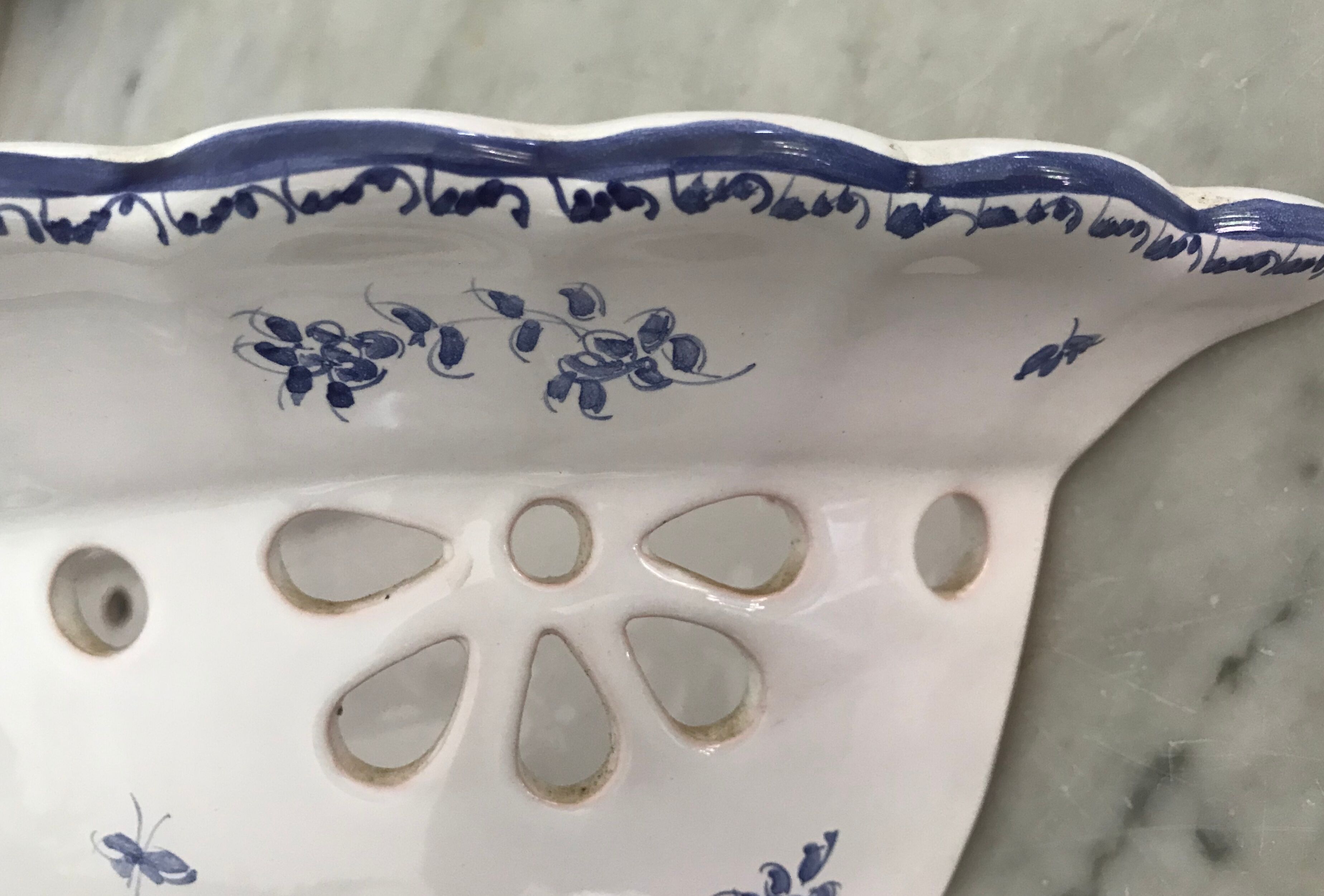 Pair of ceramic moustiers sconces