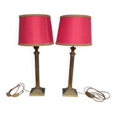 Pair of empire style lamps with red lampshades