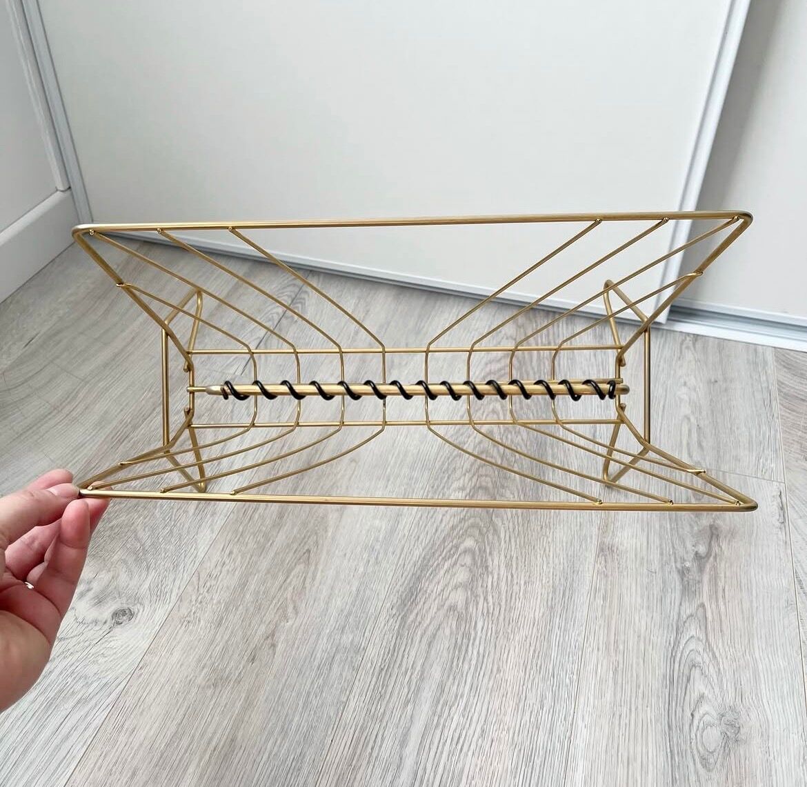 Vintage gold metal magazine rack