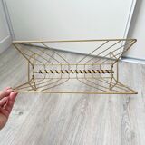 Vintage gold metal magazine rack