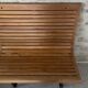 Train bench or metro in wood 1900 with its luggage rack