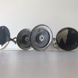 Four twisted silver candlesticks