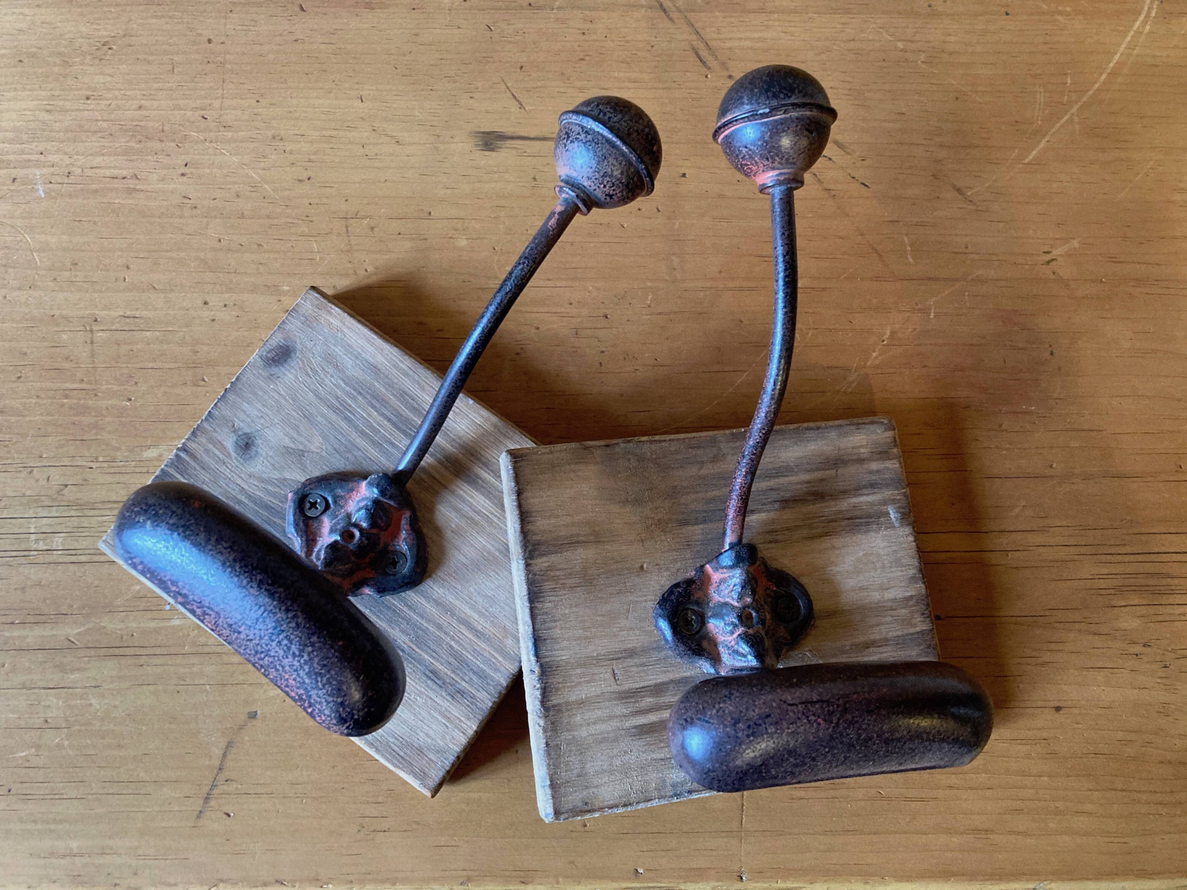 Wooden and metal coat hooks
