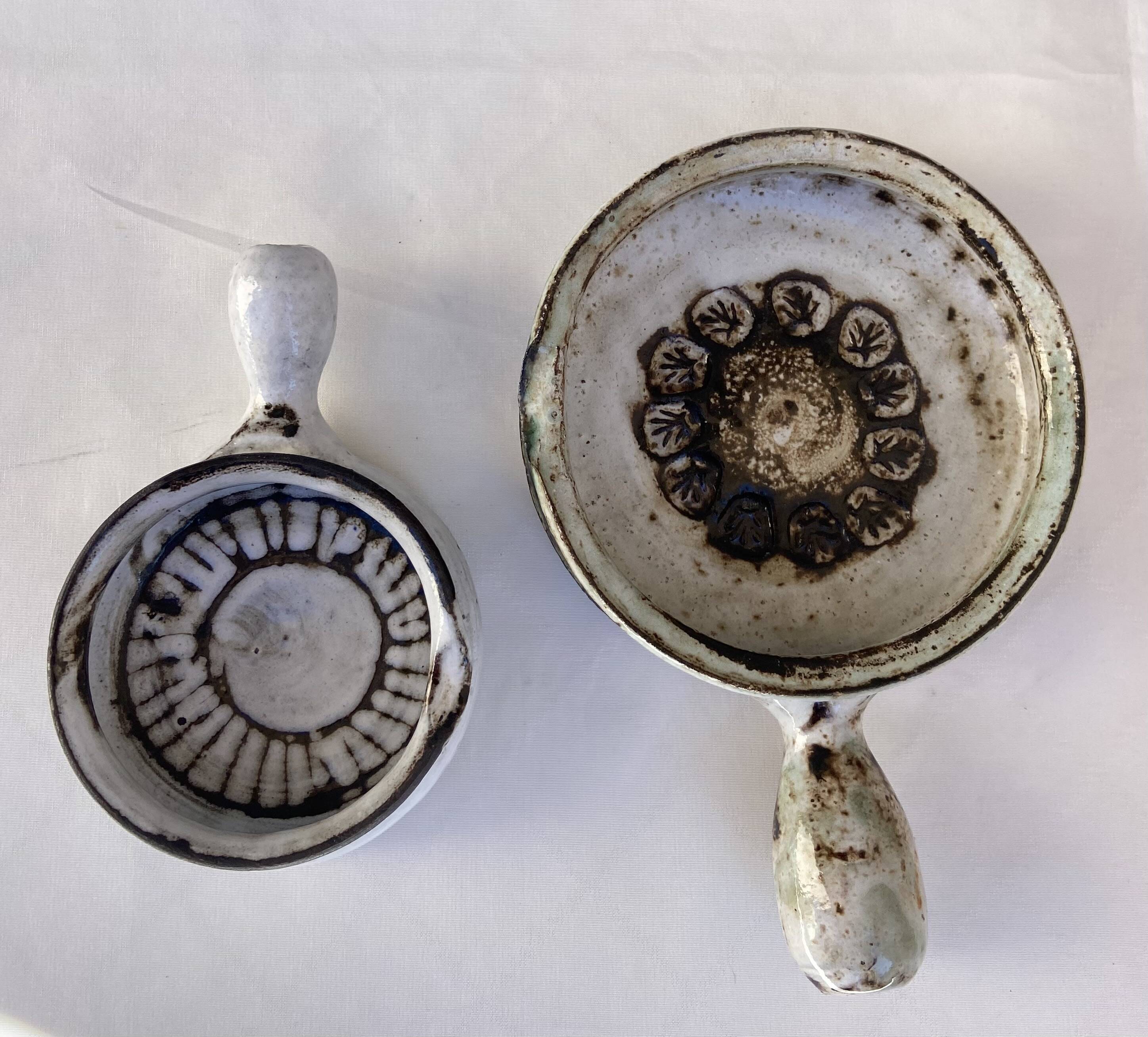 Two fondue pots by Albert Thiry