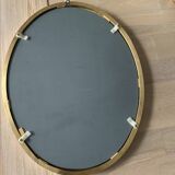 Oval brass mirror