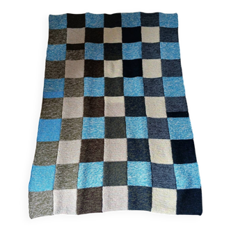 Hand knitted patchwork plaid