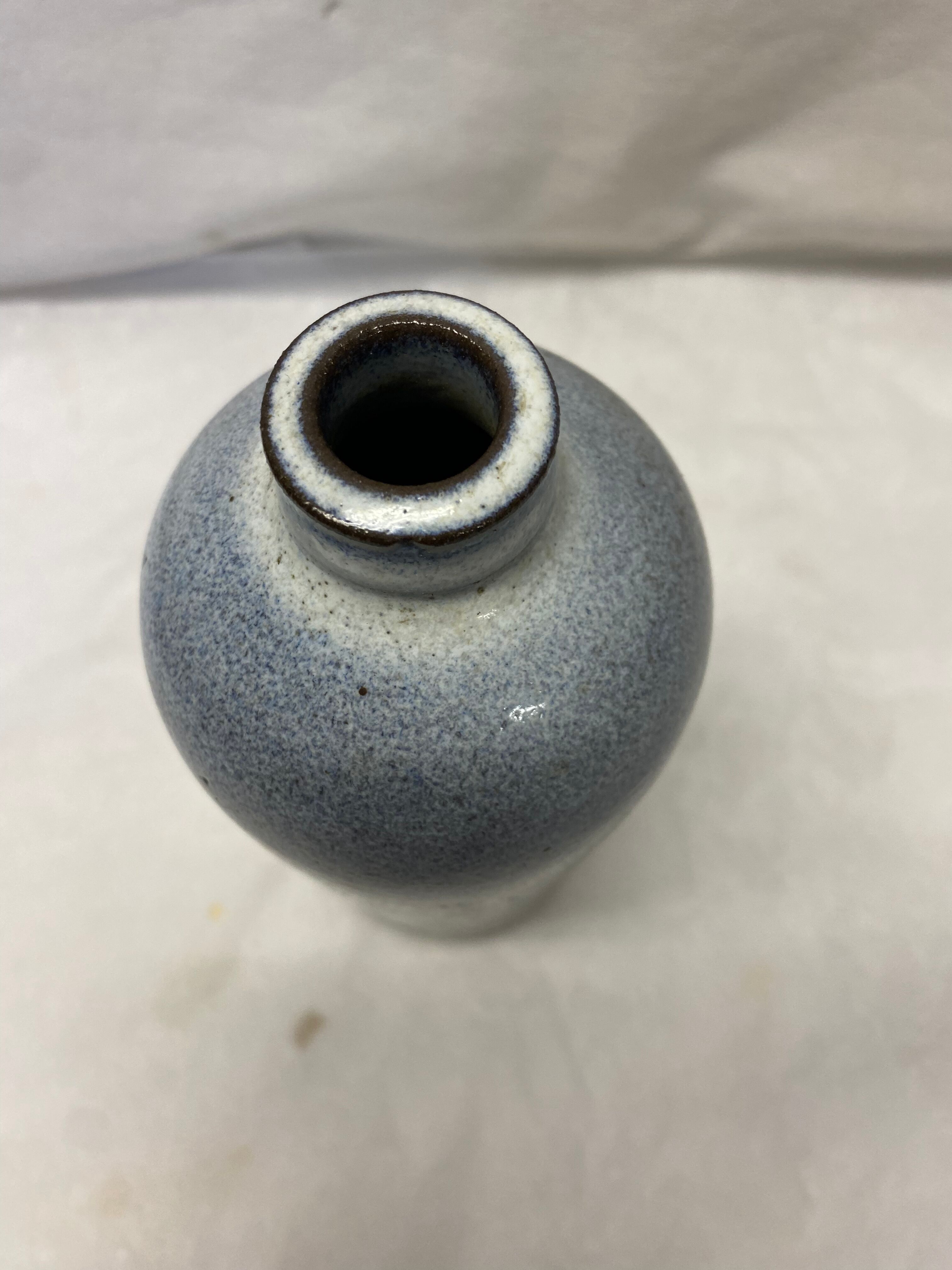 Bottle in bluish grey sandstone