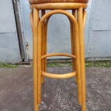 High bar stool in woven rattan