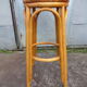 High bar stool in woven rattan