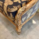 Armchair in a wooden confessional style with black and beige cotton.