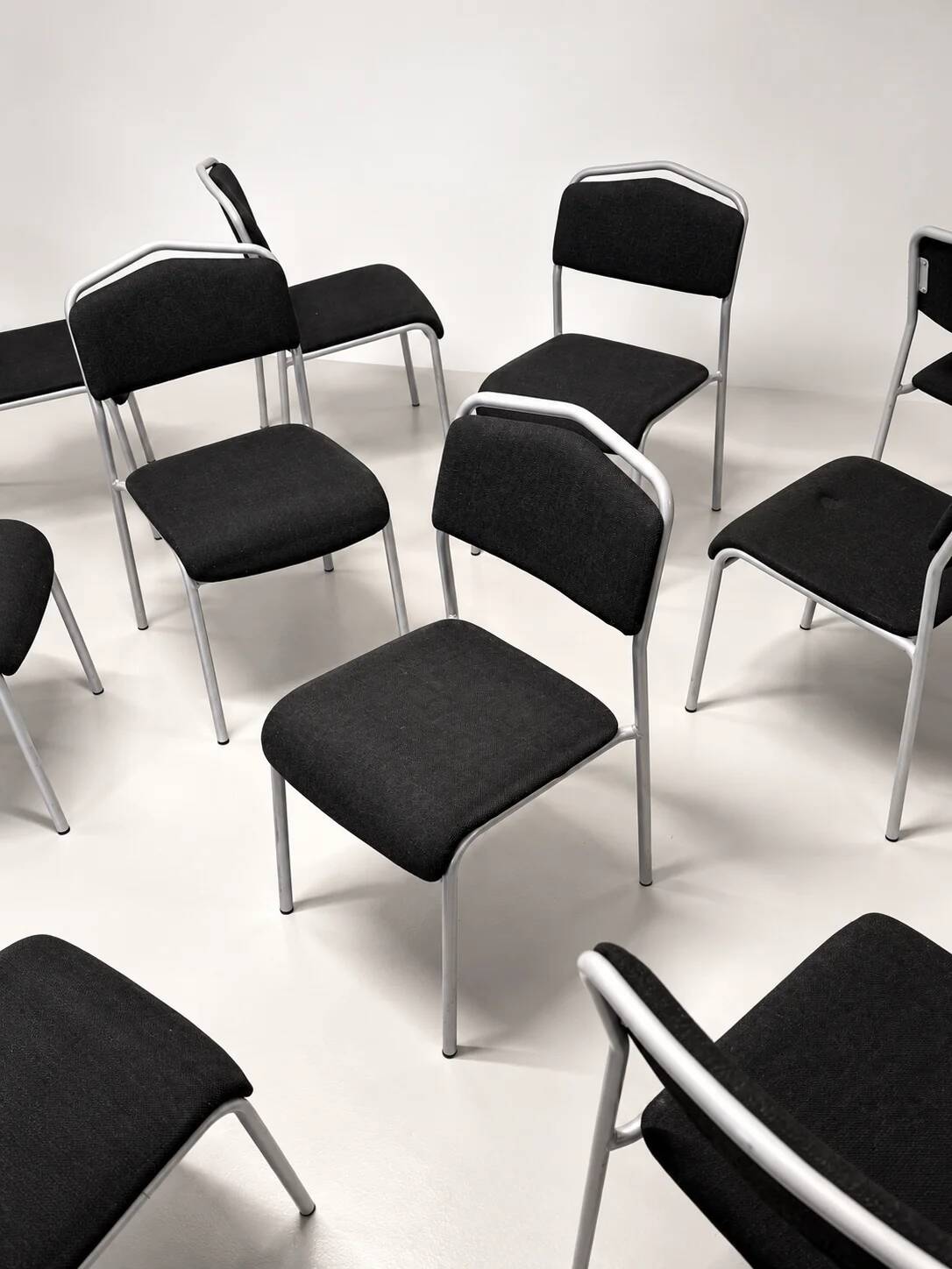 Grey steel chair and black fabric