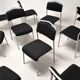 Grey steel chair and black fabric