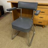 Old wooden desk and armchair