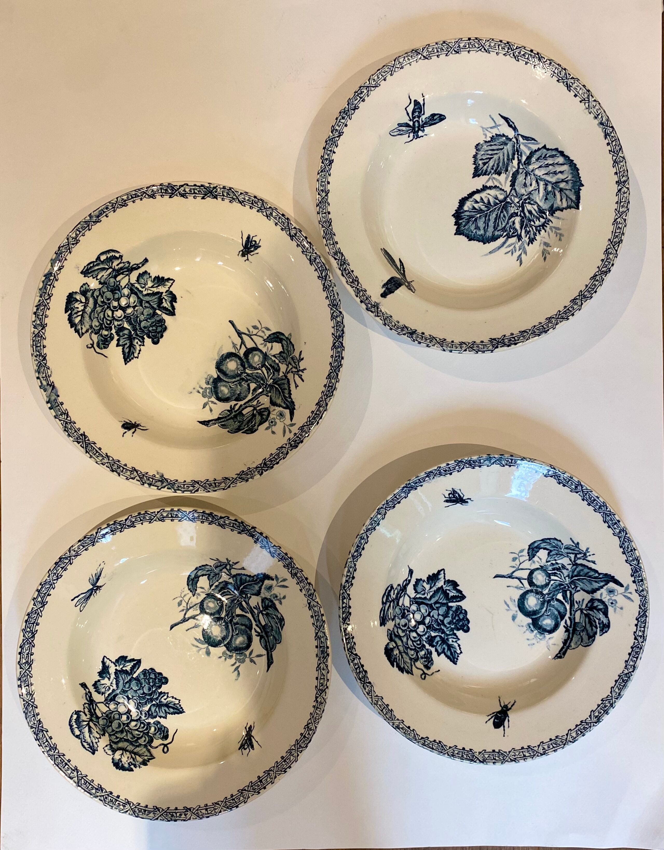 Set of 4 hollow plates, insect and fruit decorations, Manufacture Choisy le Roi, Terre de fer