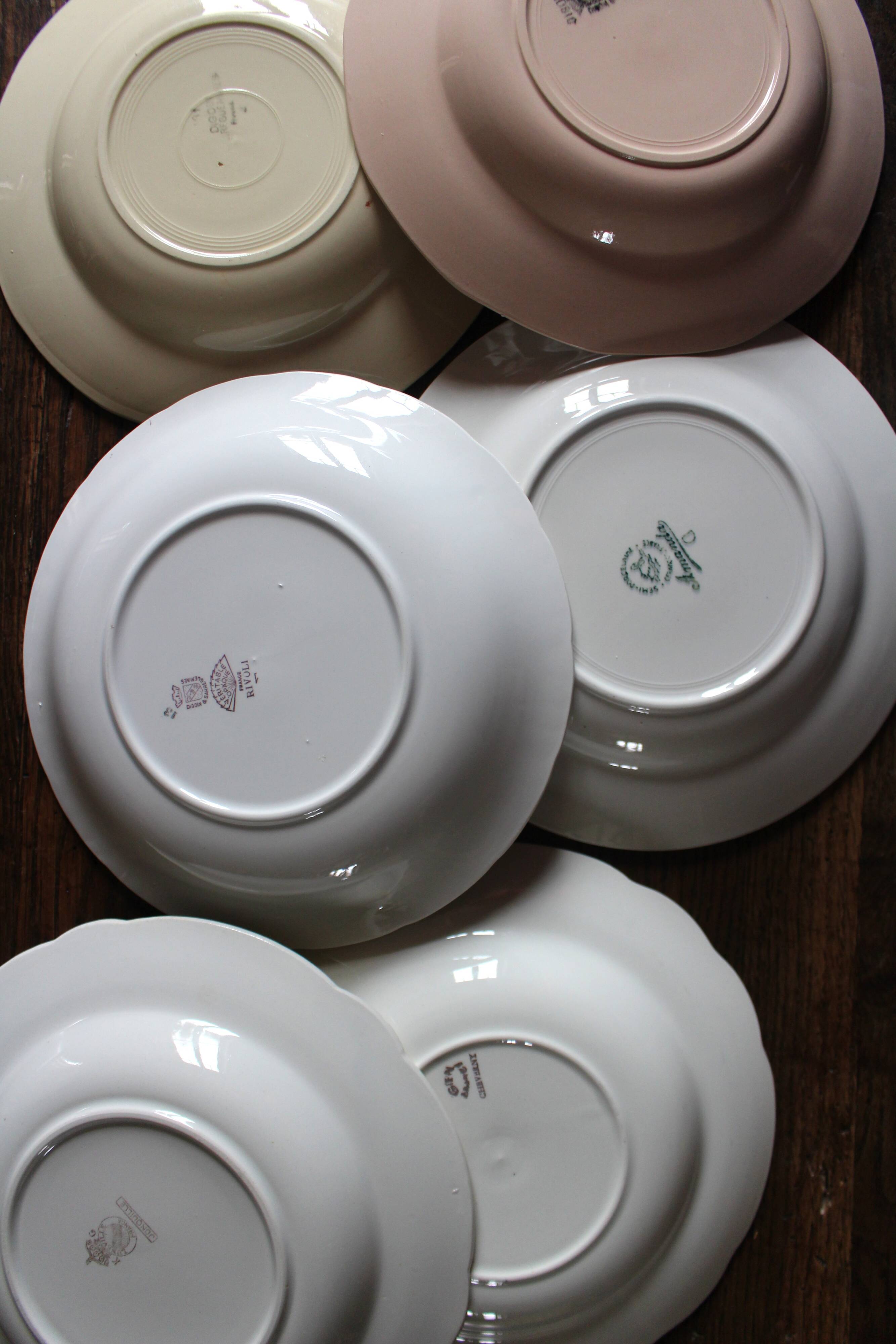 6 mismatched deep plates in floral colours from Digoin, Sarreguemines, Gien.