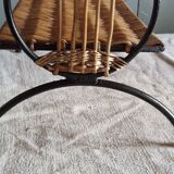 Small antique piece of furniture from the 1960s made of rattan and wrought iron in the shape of a lyre.