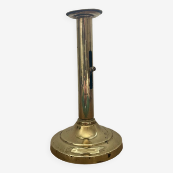 Vintage brass candle holder with push button