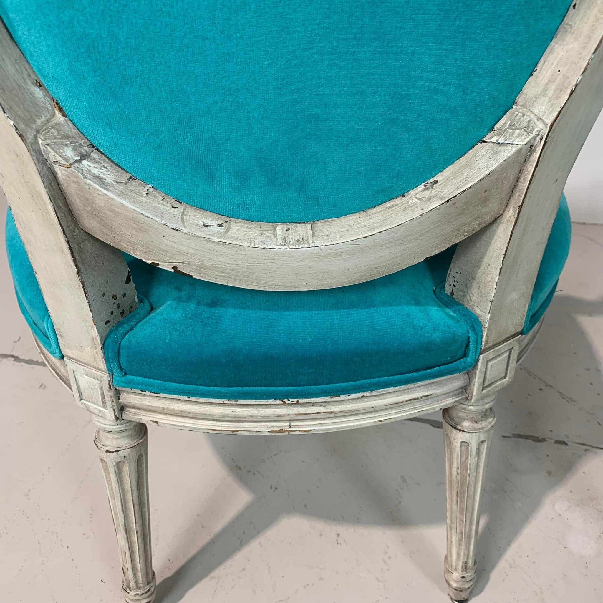 Pair of Louis XVI convertible armchairs