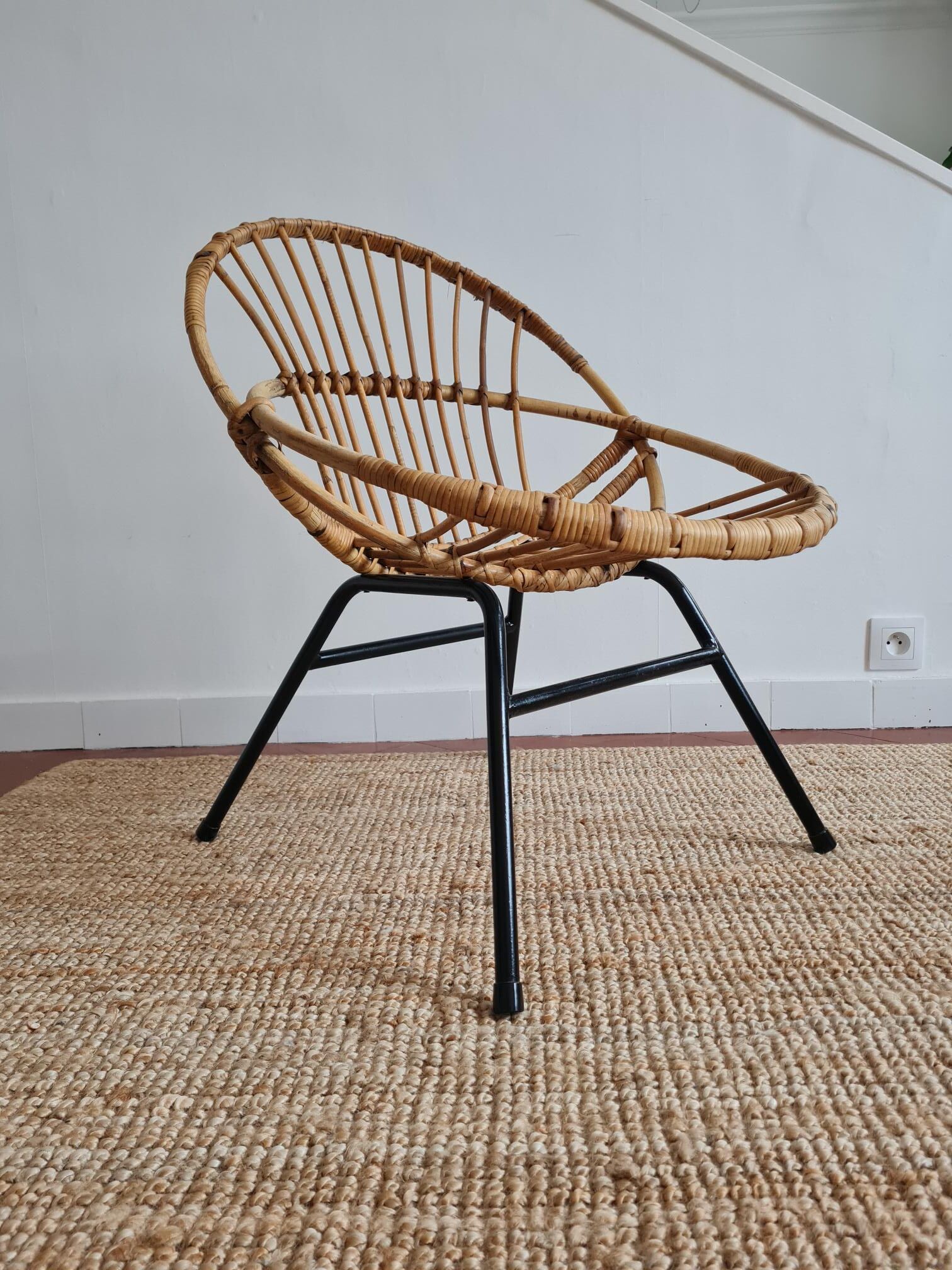 Vintage rattan shell armchair from the 60s